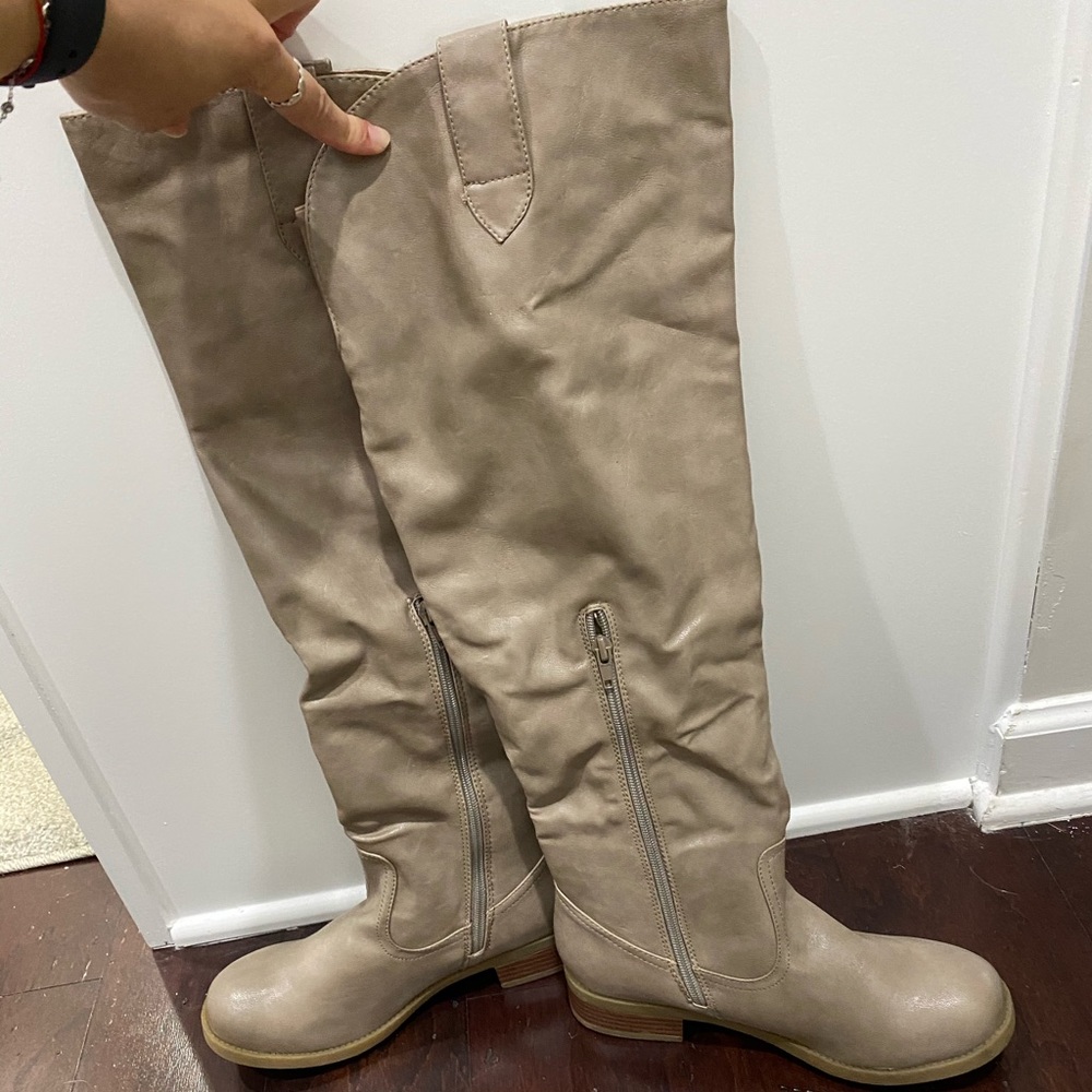Knee high taupe boots. Never worn